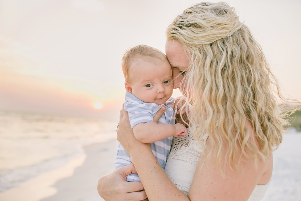 a newborn photography session on the beach in rosemary beach florida